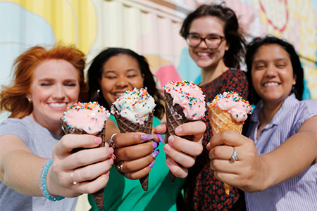 group of friends eating ice cream